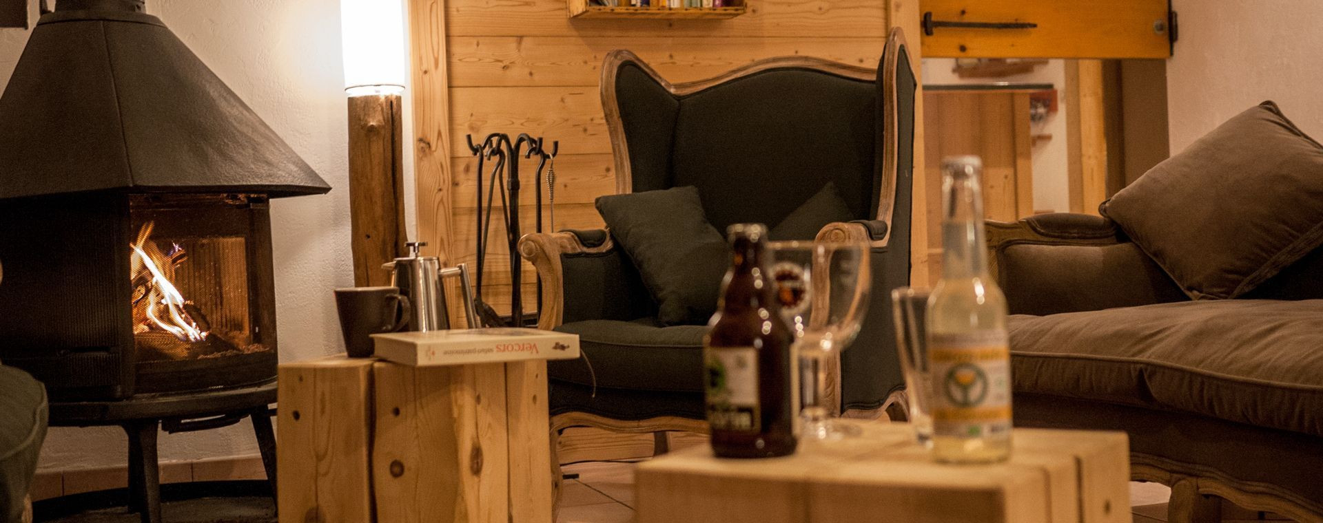 Salotto accogliente con stufa a legna del gîte Arcanson - Méaudre - Vercors - Francia
