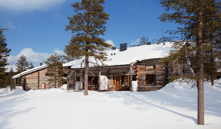 Chalet di tronchi sotto la neve - Saariselkä - Lapponia finlandese