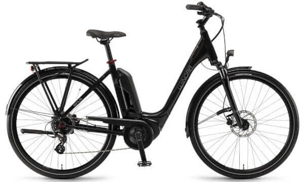 donna con bicicletta elettrica a noleggio, Megasportravel